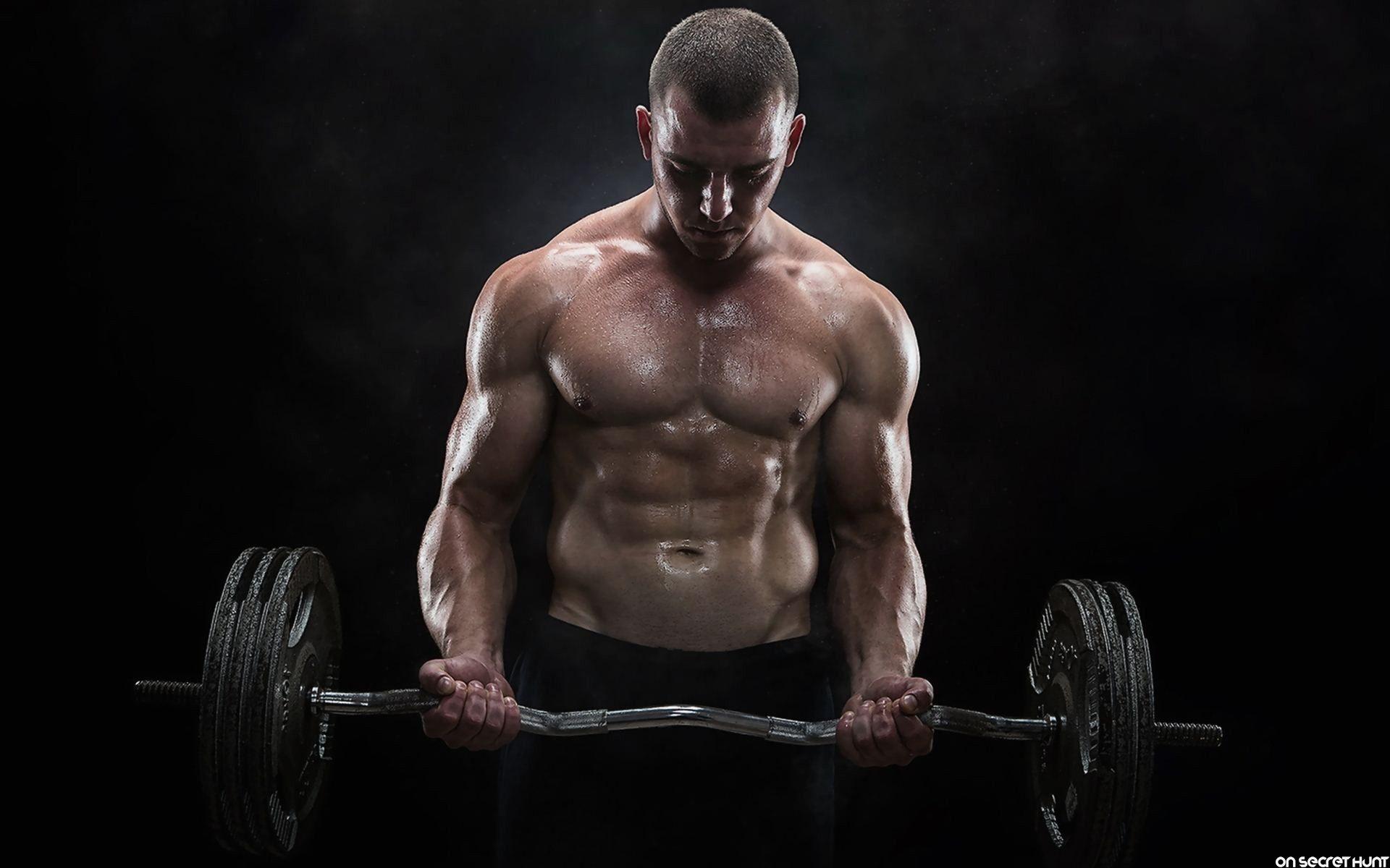 Athlete performing explosive kettlebell swings at Apex Fitness